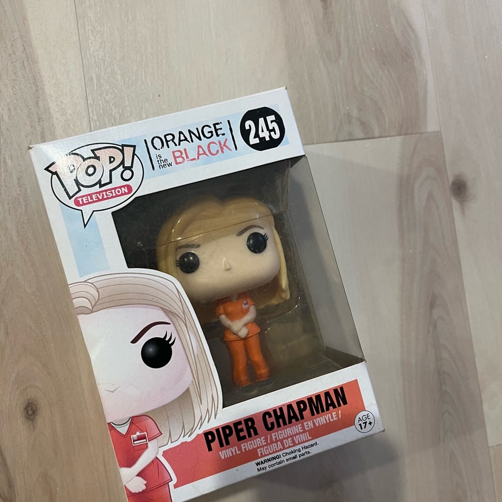 Funko Orange and Black Piper Chapman Figure